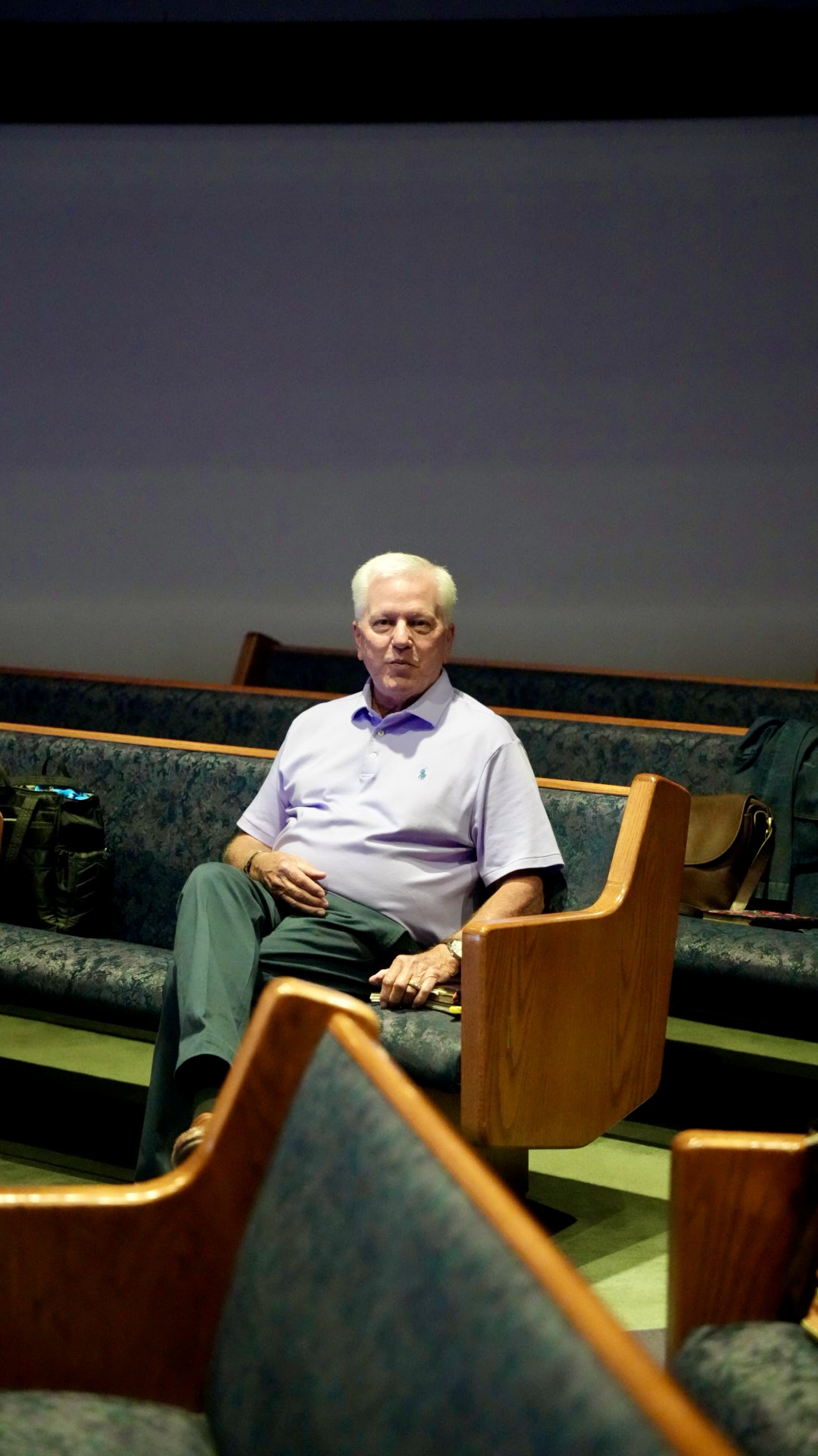 A church member seated in the sanctuary