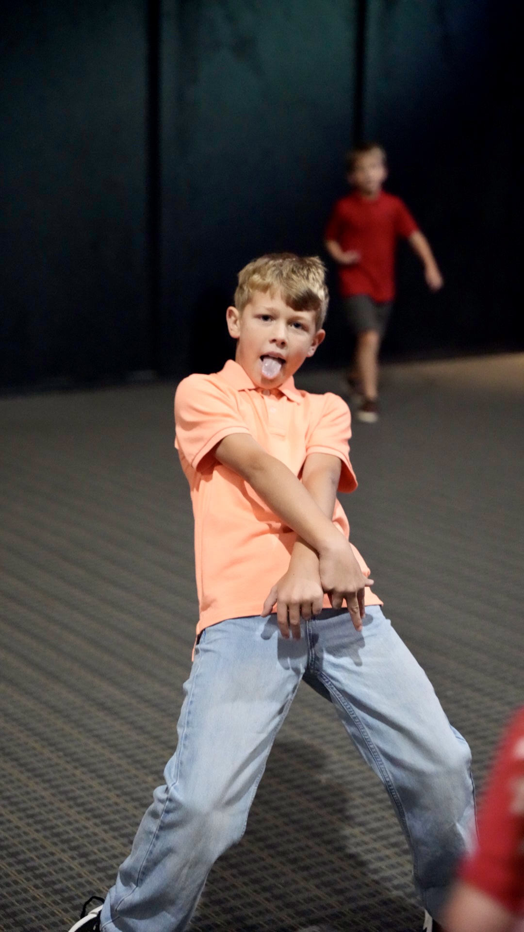 A boy posing for the camera during kids games