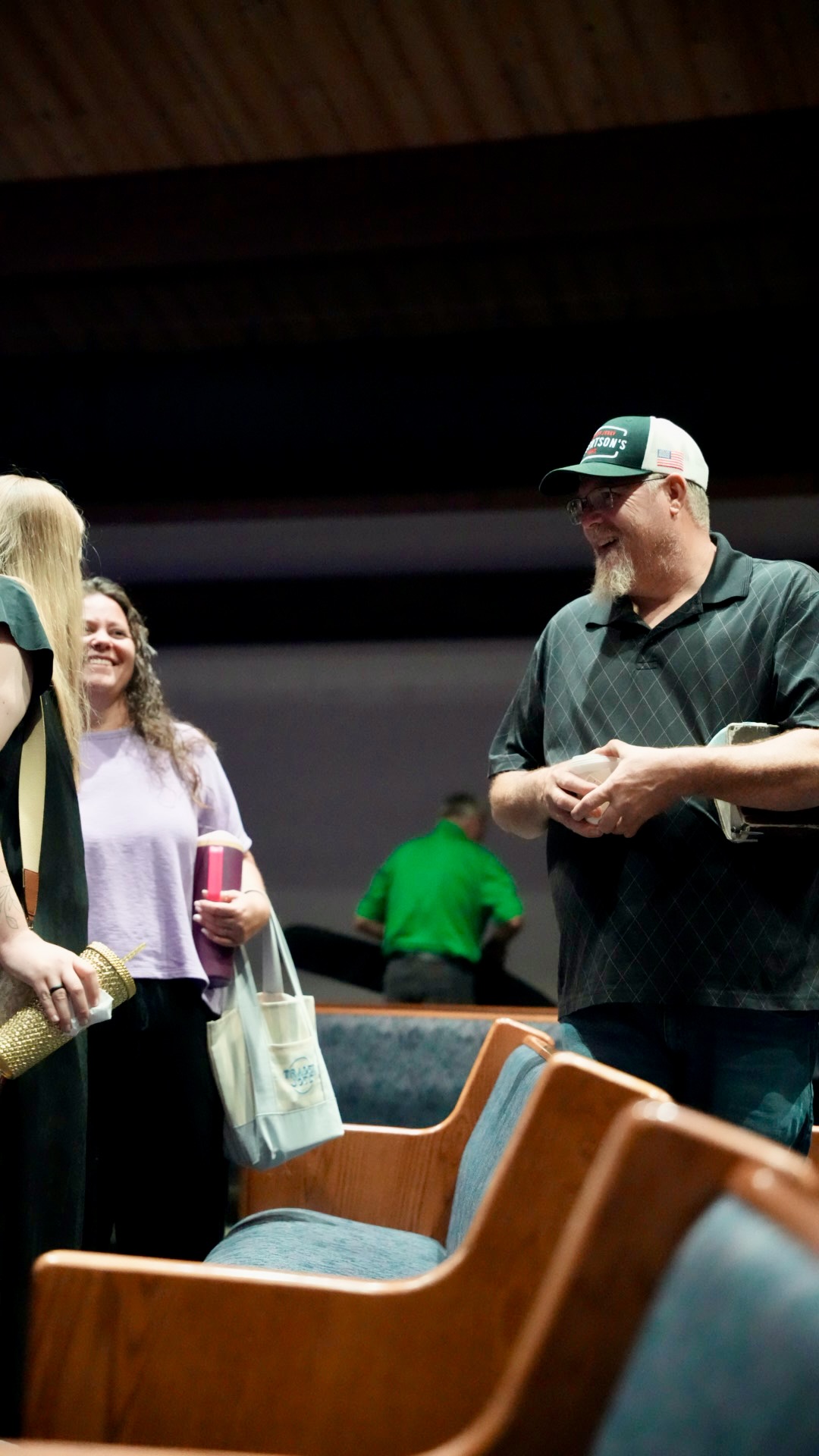 Church members laughing together after service