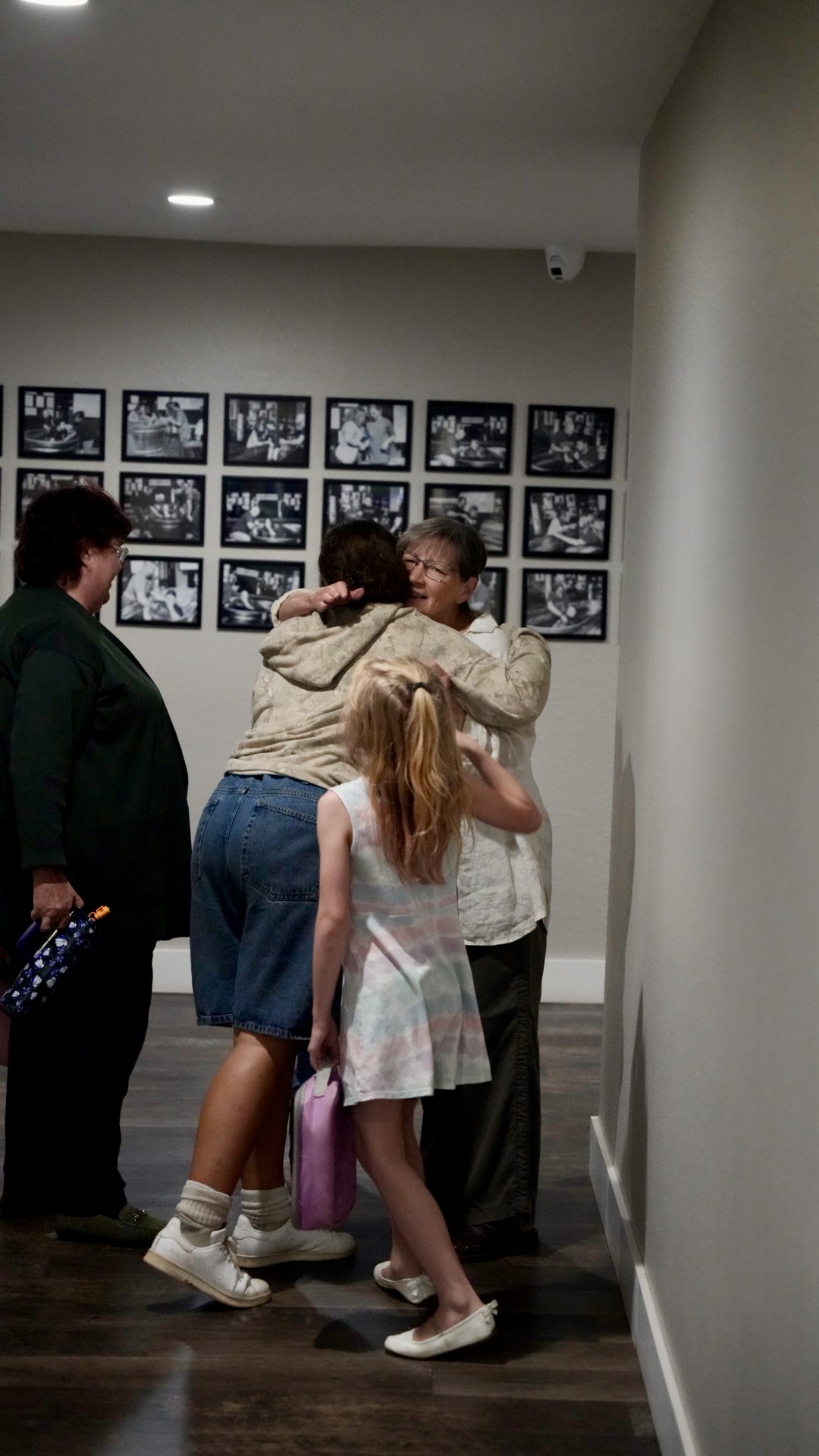 A warm hug in the hallway after service