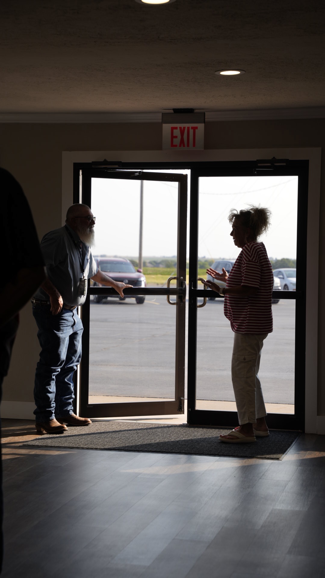 Members greeting one another at the church entrance